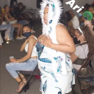 This is a large Peacock inspired Jean dress. Made by Dexx